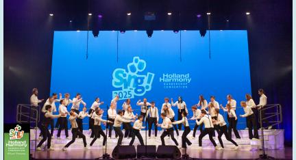 ein Bild des BinG! Youth Chorus auf der Bühne der SinG! Holland Harmony Convention. Foto: Eric Ideler